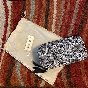 wristlet, wallet, crossbody w/wrist strap. Black/white print. New w/tags.